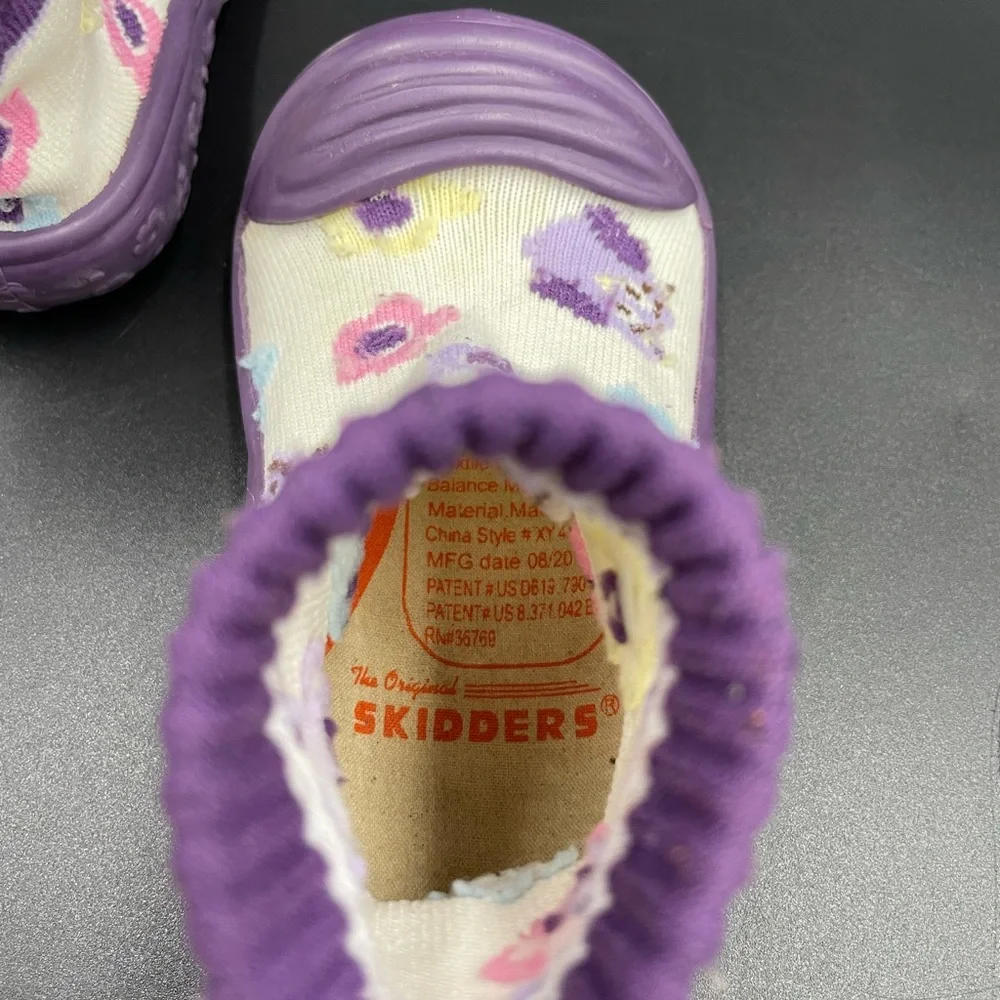 White/purple skidders size 6 toddler walking sock shoes